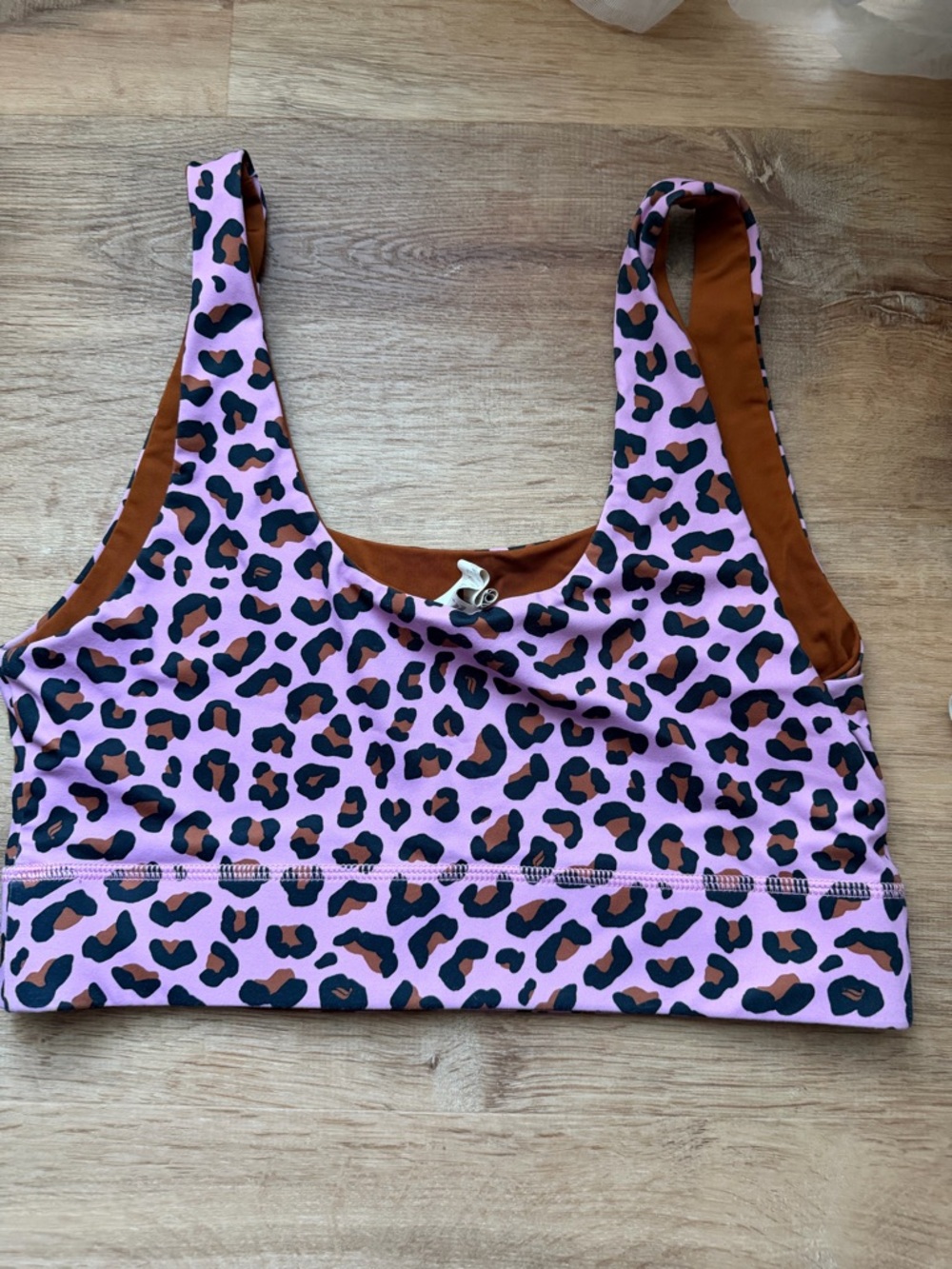 Fabletics Reversible Sports Bra with Pink Leopard and Rust Lining